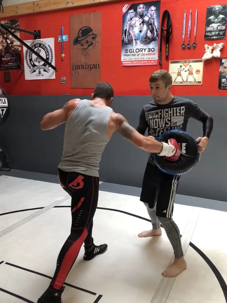 One on one boxing pad work at HB Fight Club in Huntington Beach CA