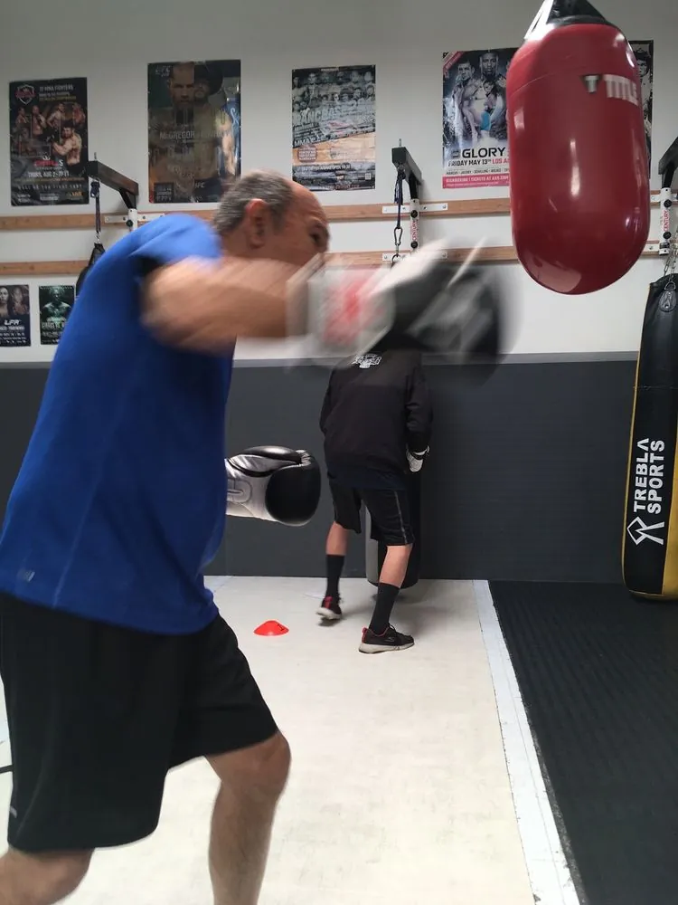 Senior speed bag boxing training at HB Fight Club Huntington Beach CA